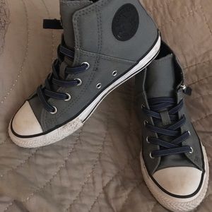 Kid’s size 2 converse high tops.
